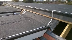 Kingsley Roofing completed a felt roof on this apartment block on Slough. This picture gives an interesting view of the part finished roof and the felt layers